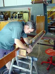 Richard wiring up the soundboard magnets._0